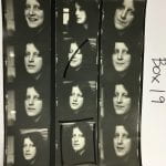 Three strips of negative black and white film of portraits of a white woman with dark hair, one image crossed out, labelled as Box 19