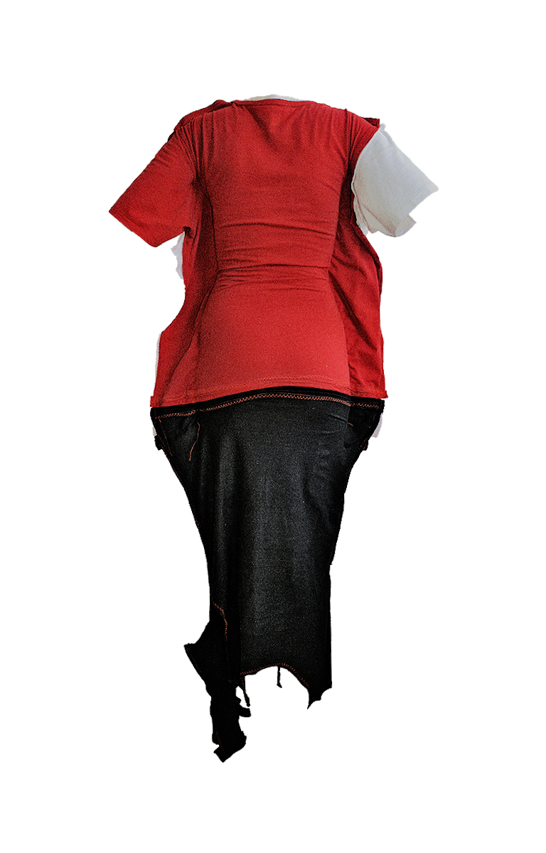 An abstract sculpture made from red, white and black clothes against a white background.