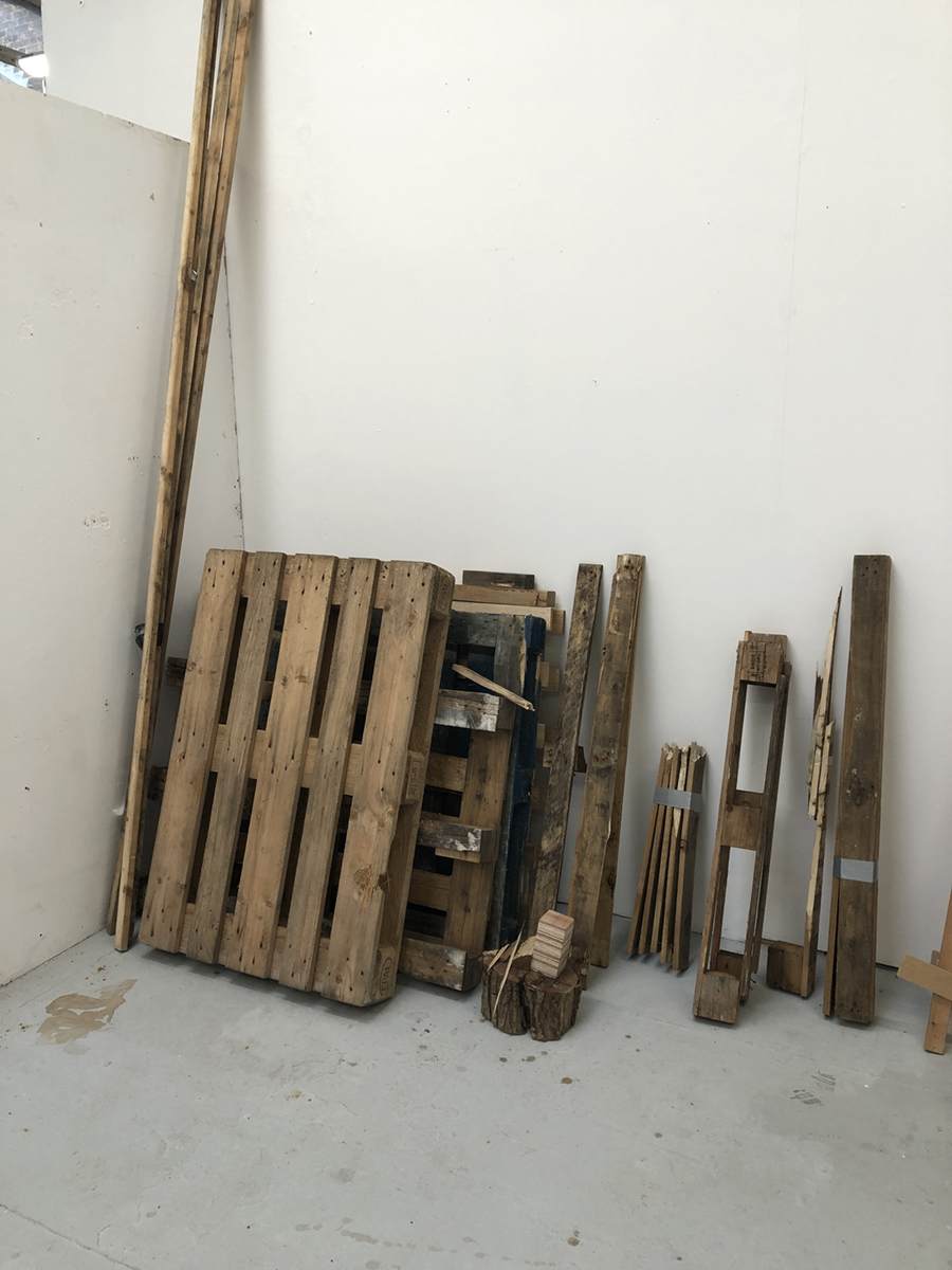A stack of components made from the wood taken from dismantled pallets.