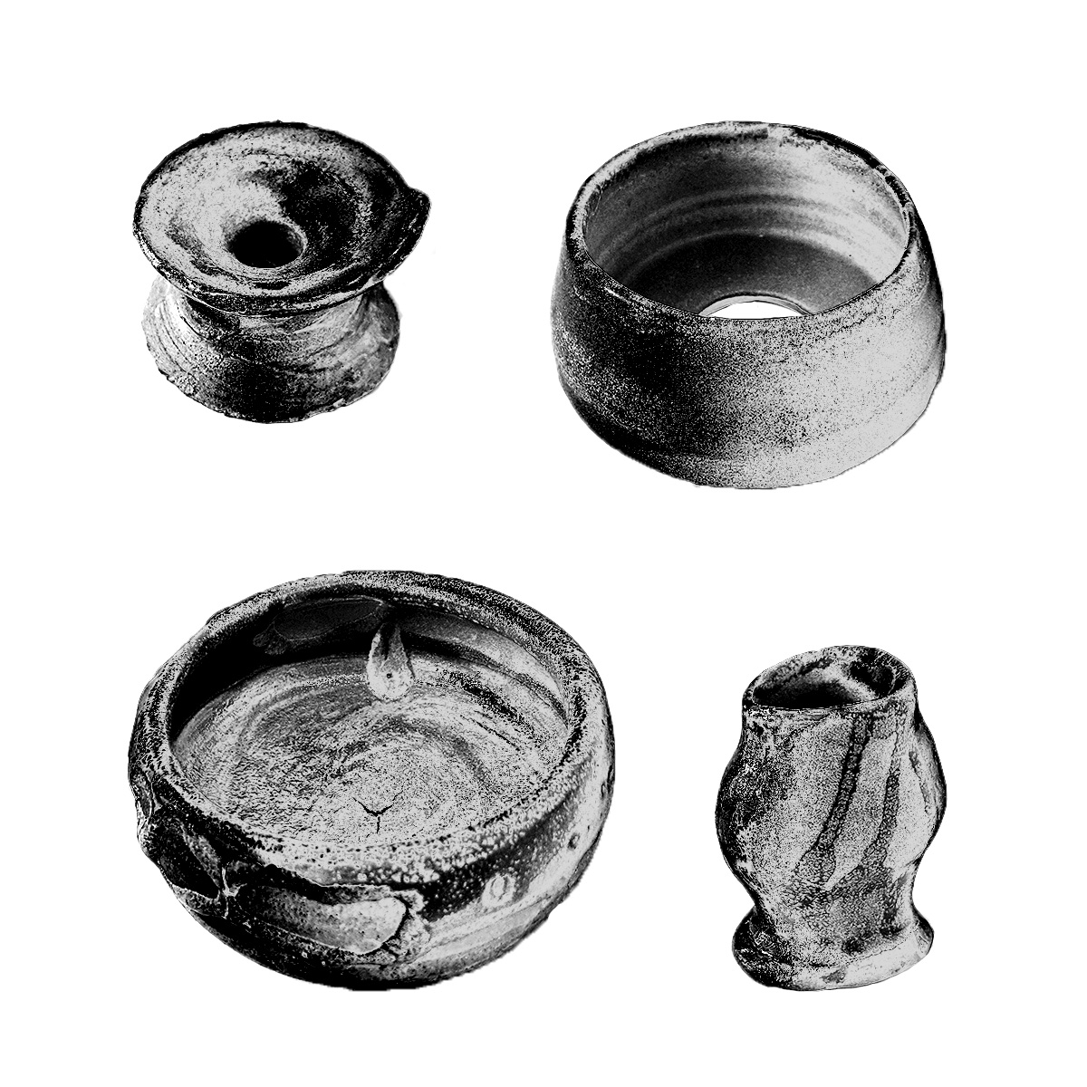 A greyscale picture of four ceramic vessels.