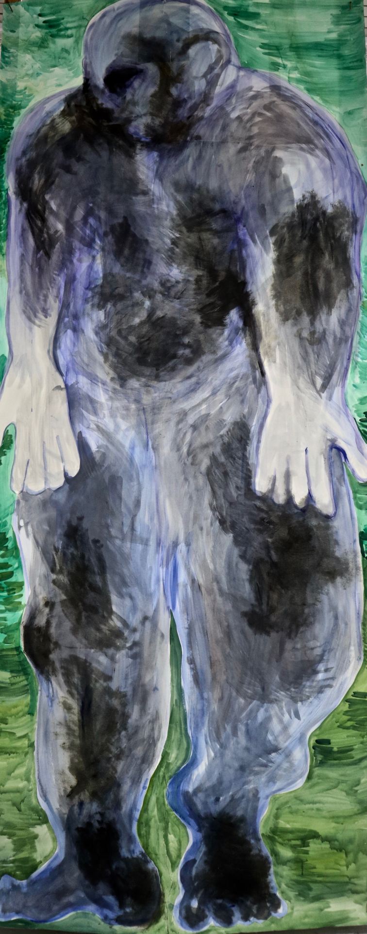 A drawing of a faceless giant against a green background.