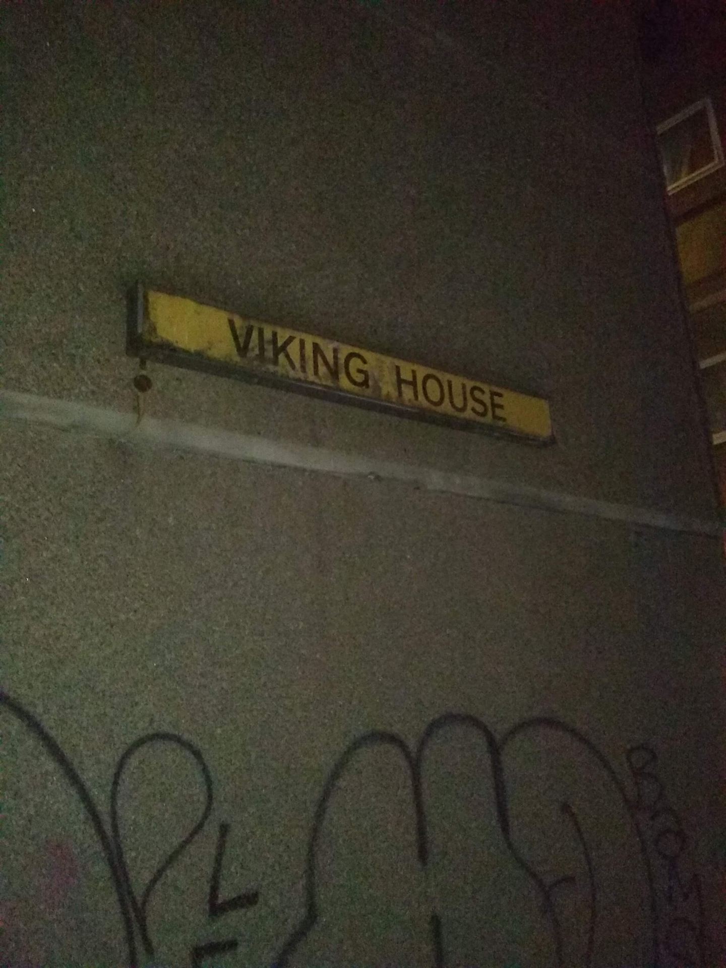 An image of a sign that reads "Viking House".