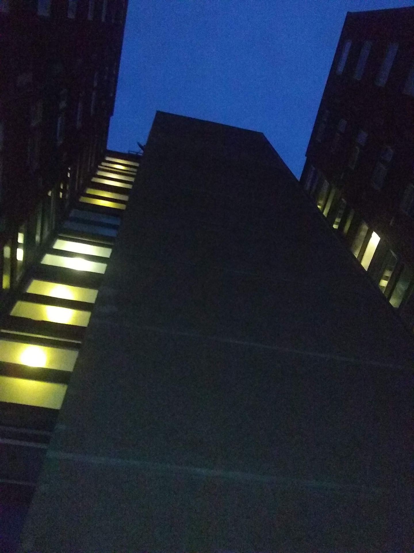 An image looking up at a high-rise.