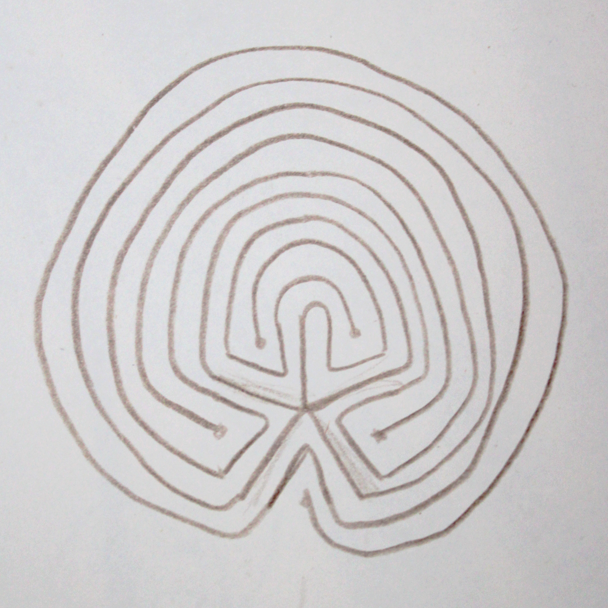 A drawing of a variation on a classic-style labyrinth with a 5-point centre, drawn in thin brown lines on a plain white background.