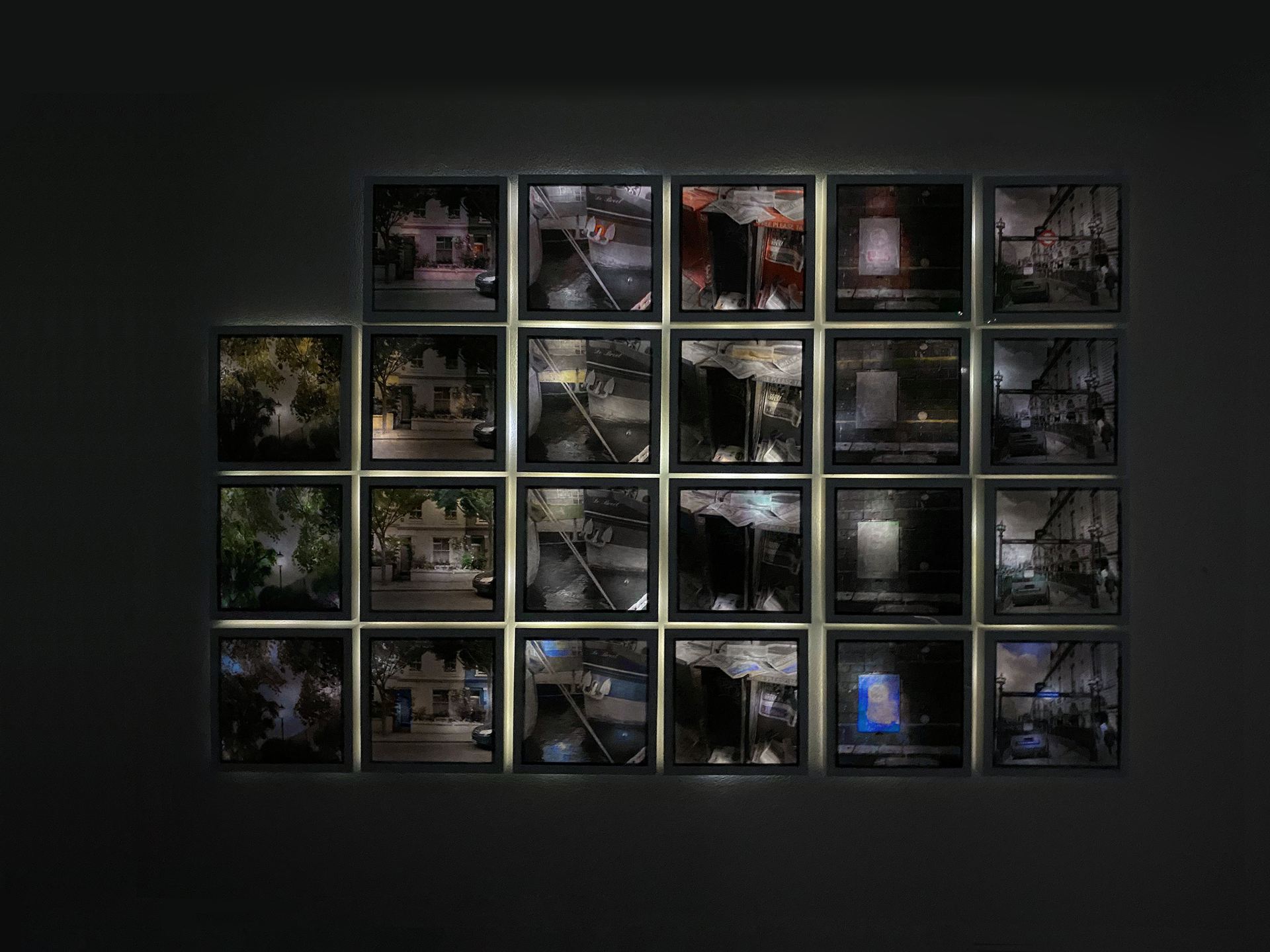 An image of a grid of abstract images in white, square frames against a black background.