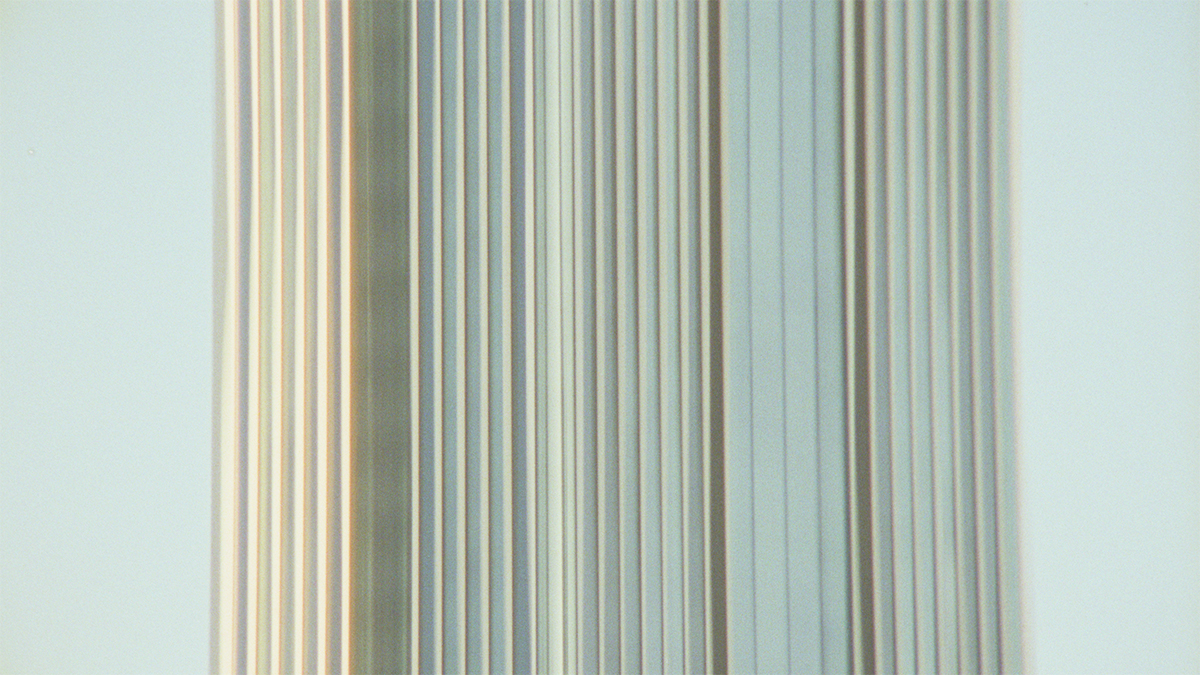 A video still of multiple vertical lines.
