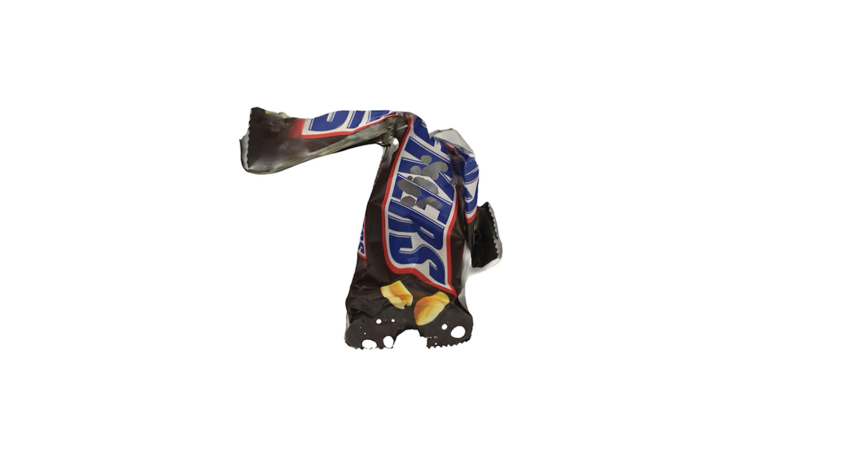 A still from a video of a 3D scan of a Snickers wrapper.