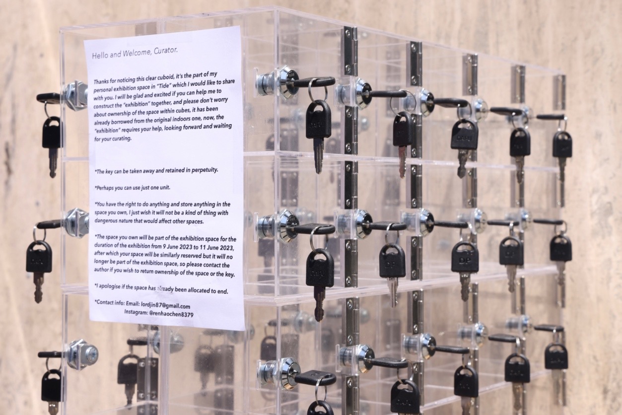 An image of many keys hanging on clear perspex.