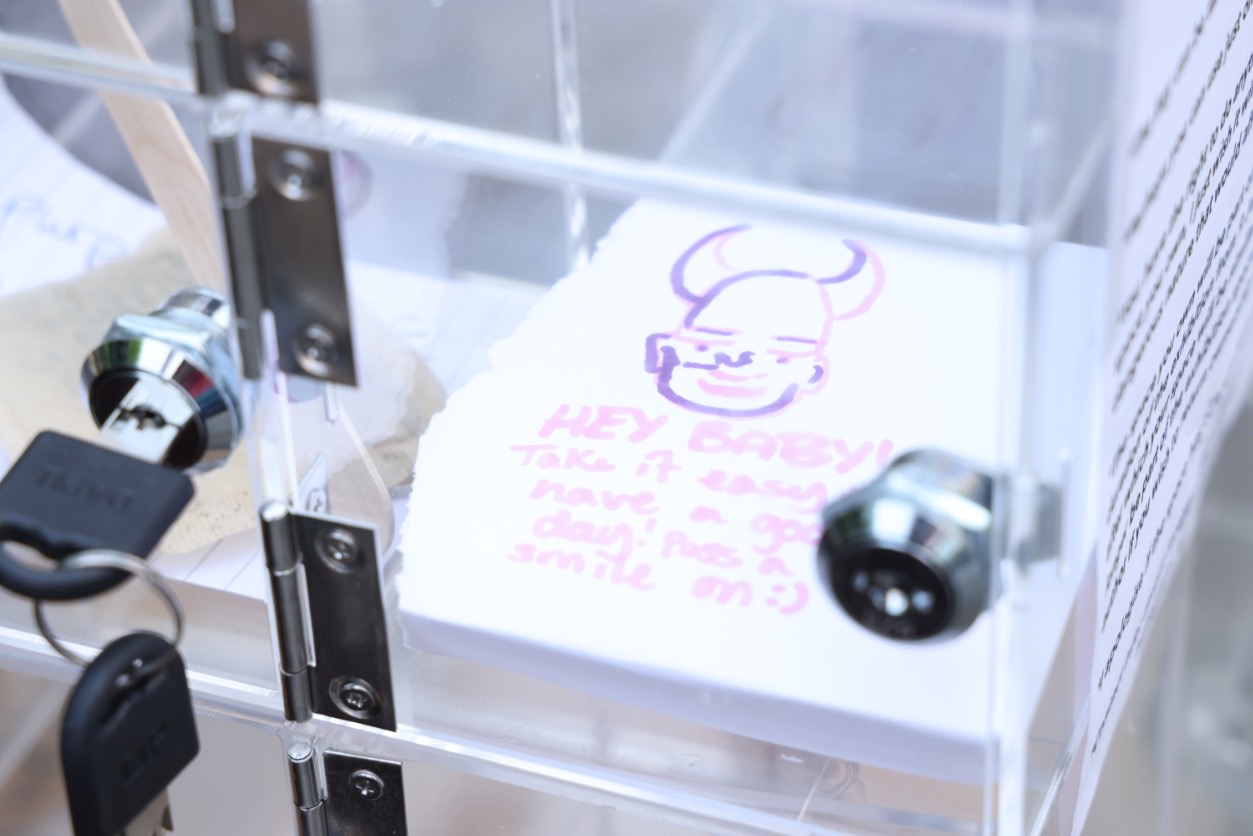 An illustration of a chef, locked in a clear perspex box.