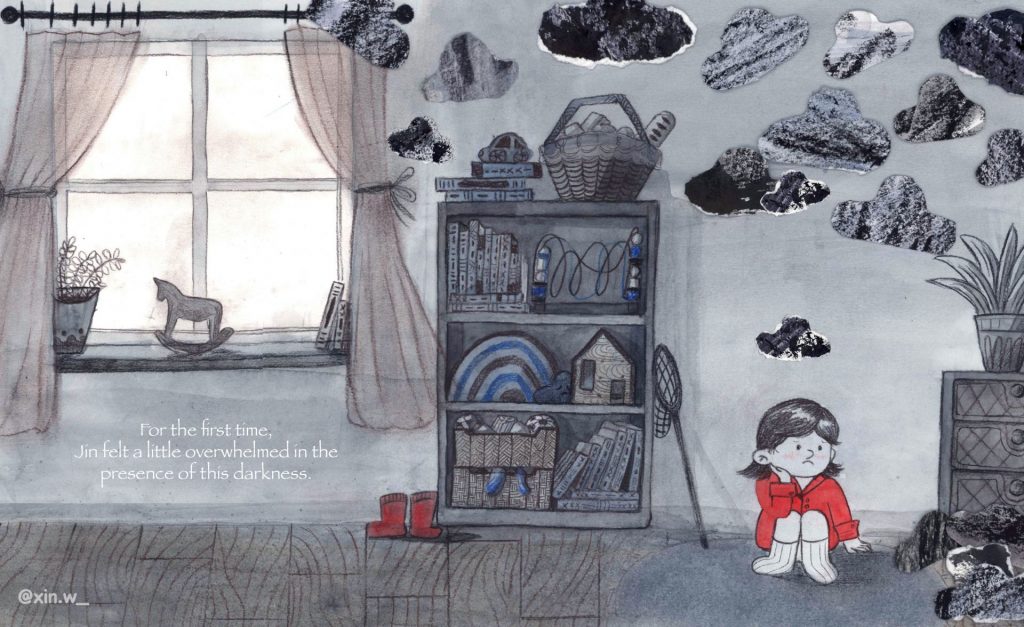 A girl sits in a grey room with dark clouds above her