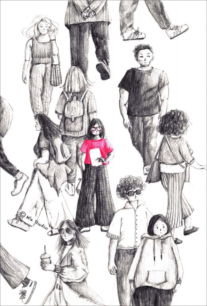 A girl in pink stands amongst a group of people in black and white