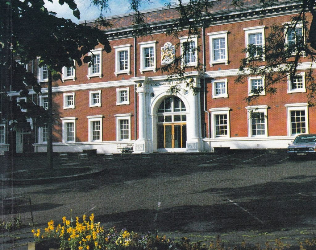 Colour photograph of the front of Goldsmiths' College main building around 1990 with a car parked far right.
