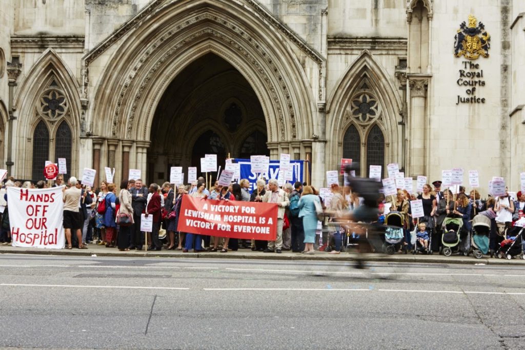 People protest outside the High Court to save Lewisham Hospital's A&E and maternity services