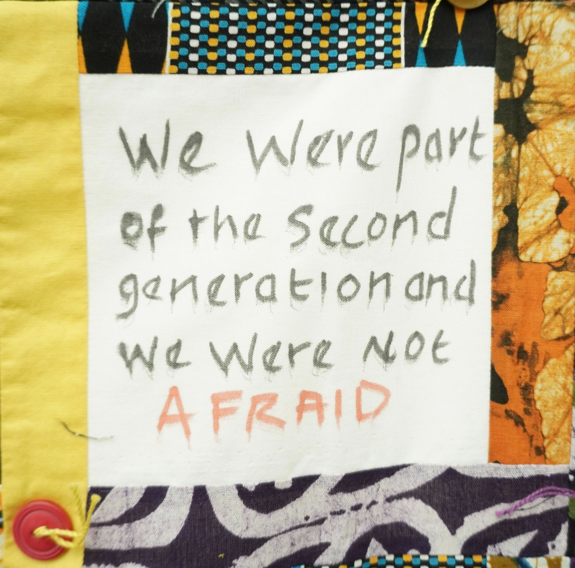 Commemorative quilt. Text reads, 'We were part of the second generation and we were not afraid'