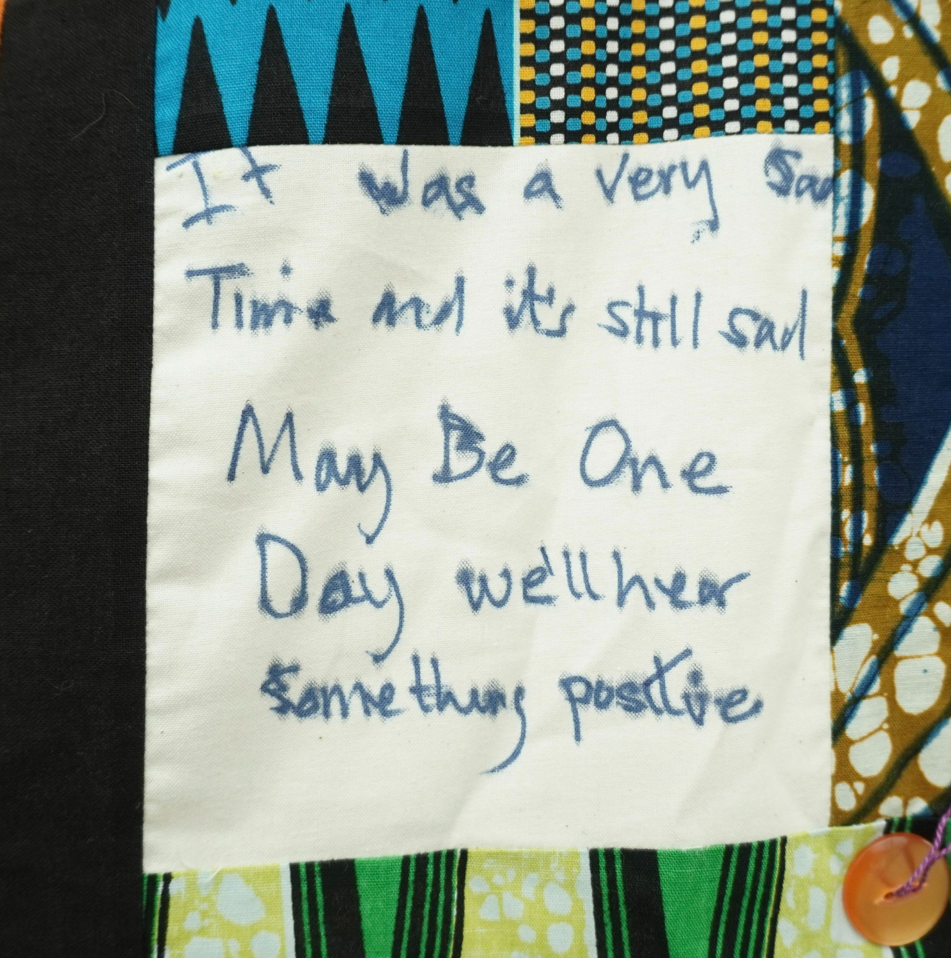 Commemorative quilt. Text reads, 'It was a very sad time and it's still sad. Maybe one day we'll hear something positive'