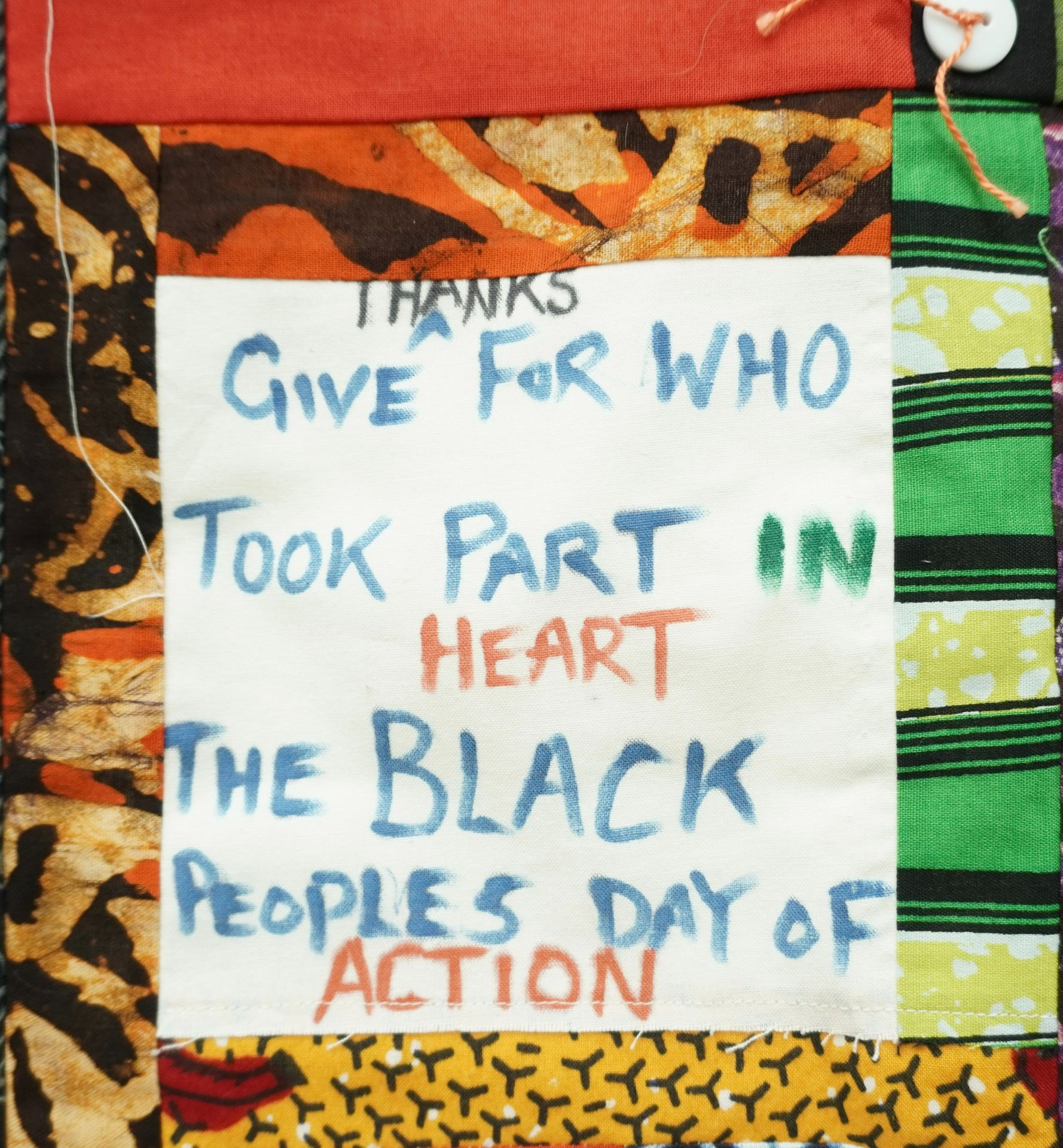 Commemorative quilt. Text reads, 'Give thanks for who took part (heart) in the Black People's Day of Action'