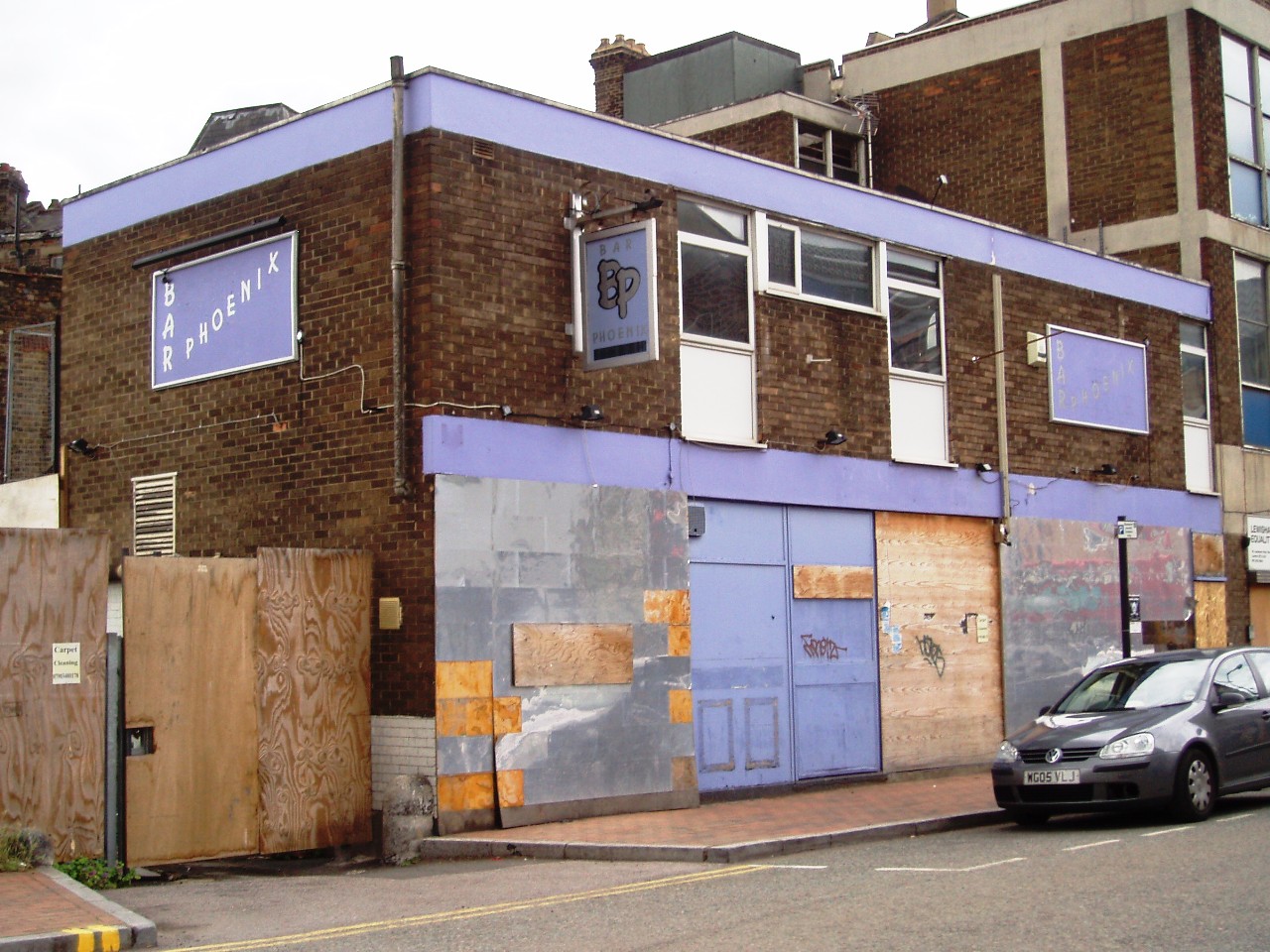 The damaged, neglected exterior of a pub