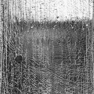 Black and Photograph of cracked glass