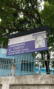 sign for 'shanti dan' a missionaries charity home providing lifelong care for mentally and physically disabled women from economically disadvantaged backgrounds